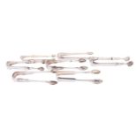 Six Scottish silver sugar tongs comprising of: one provincial by Thomas Davie,