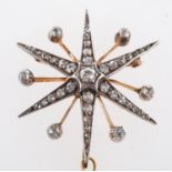 A diamond star brooch, a star brooch set with a mixture of old mine-cut and rose-cut diamonds,