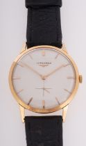 Longines an 18ct gold gentleman's wristwatch the cream dial signed Longines with raised baton