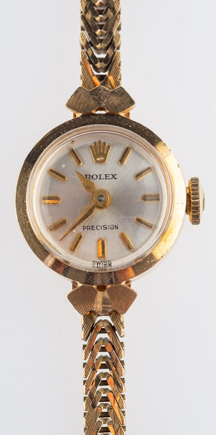 Rolex a lady's 9ct gold wristwatch the dial having baton numerals and hands,