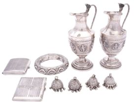 A pair of late 19th century Indian colonial silver ewers, not marked, probably Bangalore circa 1890,