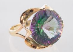 A mystic topaz ring, a circular-cut mystic topaz in an openwork flower style setting, marked 14k,