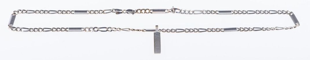 A fancy link curb chain, with an elongated rectangular pendant engraved 'Diabetic', both marked 14k,