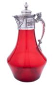 An early 20th century electroplated claret jug, with a ruby glass body, 27cm (10.