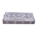 A Persian silver table box, marked 84, of rectangular form, engraved carpet design,