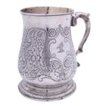 A George II silver mug by Richard Gurney & Thomas Cook, London 1751, of baluster form,