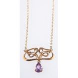 A 9ct yellow gold 'Art Nouveau' style necklace set with a pear-shaped amethyst drop, length 38.