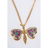 An 18ct yellow & white gold butterfly pendant and chain,