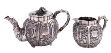 A small mid 19th century Chinese export silver tea pot,