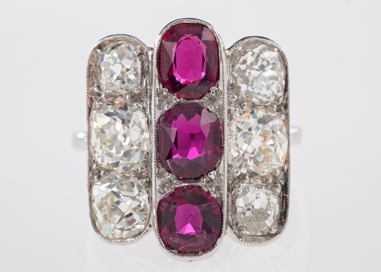 An Art Deco Ruby & Diamond Ring, a geometric designed three row ring, - Image 2 of 2
