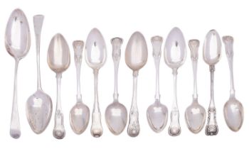 A match group of nine Scottish silver single-struck King's pattern dessert spoons,