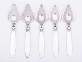 Five Danish silver Cactus pattern grapefruit spoons by Georg Jensen, import marked for London 1935,