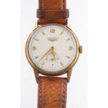 Longines a 9ct gold gentleman's wristwatch the round cream dial signed Longines and having raised
