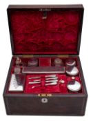 An early 20th century silver and glass vanity case in a rosewood case not marked;