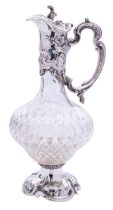 A mid 20th century silver plated and cut glass claret jug, not marked, 31cm (12.