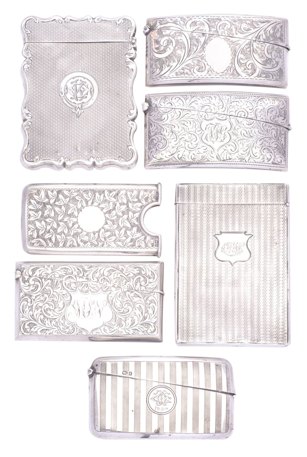 A small collection of silver card cases,