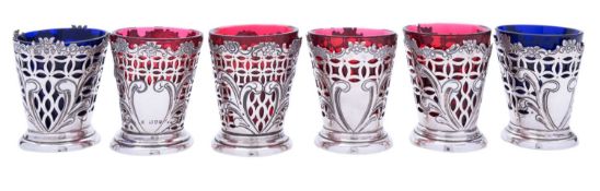 A set of six Victorian silver posy vases with glass inserts by Charles Boyton, London 1892,