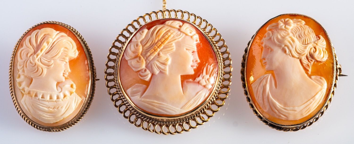 A group of three cameo brooches,