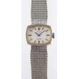 Rolex a lady's 9ct gold wristwatch the silvered cushion dial having raised baton numerals and baton