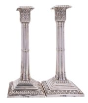 A pair of Edward VII silver candlesticks, maker's marks rubbed, Sheffield 1902,