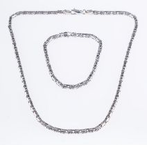 A fancy-link necklace, marked 585, length 43.