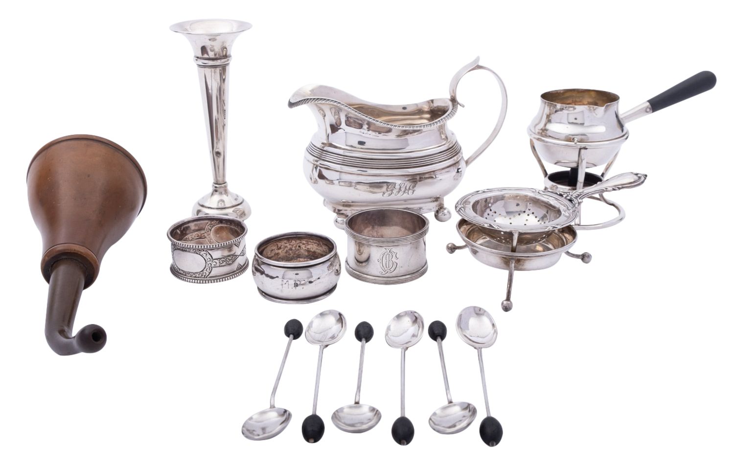 A small group of silver items comprising: a silver cream jug, marks rubbed,