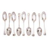 Nine Georgian silver Hanoverian pattern table spoons, various makers and dates,