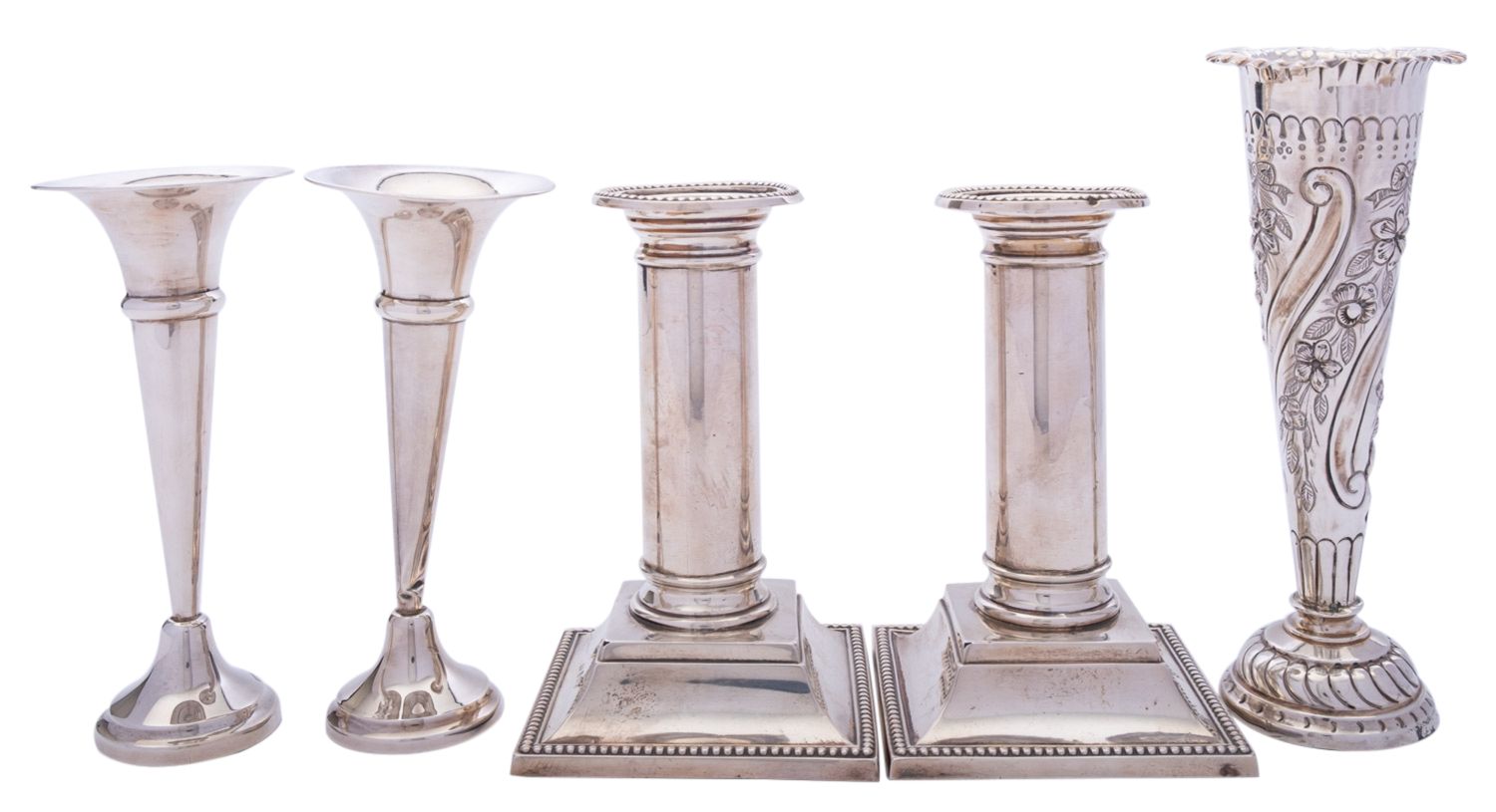 A pair of short Edward VII silver candlesticks by William Neale & Son, Birmingham 1908,