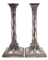 A pair of silver columnar candlesticks by West & Son, Sheffield 1911,