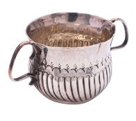A Queen Anne silver miniature toy porringer by William Fleming, London 1706,
