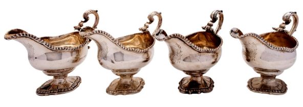 A pair of George III silver sauce boats by William Skeen, London 1765,