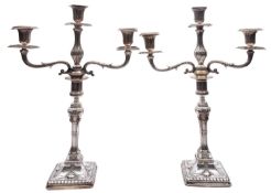 A pair of George III silver candlesticks possibly by John Carter II, London 1775,