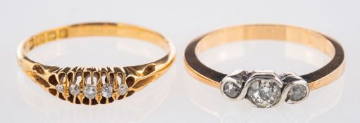 Two antique rings, including an Edwardian five stone ring set with old mine-cut diamonds,