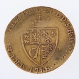 A George III gold coin, unmounted, worn, dated 1788, 4.0grams.
