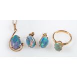 A group of opal jewellery, including a ring set with an oval opal cabochon, Foreign marks, size L,