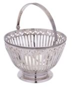 A mid 20th century American silver swing handled sugar bowl by Tiffany & Co,