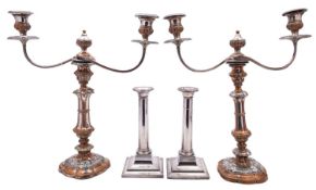 A pair of Sheffield Plated candelabra,