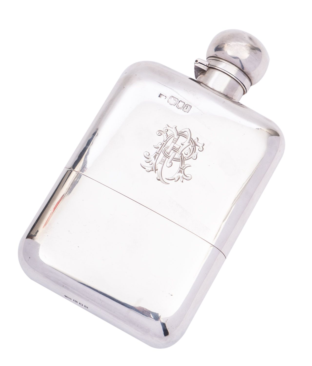 A George V silver spirit flask by Mappin & Webb Ltd, London 1916, of rounded rectangular form,