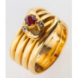 A Victorian snake ring, a coiled snake designed ring, its head set with an oval-cut ruby,