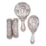 An Edward VII Art Nouveau long handled hair brush and mirror by Walker and Hall, Sheffield 1904,