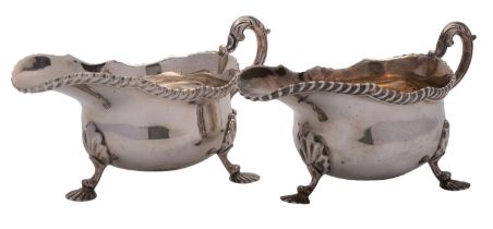 A pair of Victorian silver sauce boats by Mappin & Webb, Sheffield 1900, in the George II style,