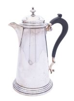 A George V silver hot water jug by Martin, Hall & Co Ltd, Sheffield 1924, of inverted tapering form,