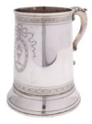 A George III silver mug possibly Hester Bateman, marks worn, London 1782, of inverted tapering form,