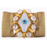 A Regency period bracelet, the buckle of flower and foliate design, set with white chalcedony,