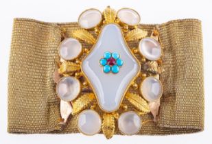 A Regency period bracelet, the buckle of flower and foliate design, set with white chalcedony,