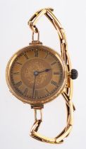 A ladies foliate engraved open faced pocket watch, gilt flower dial and Roman numeral markers,