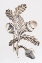 Geoffrey G Bellamy, for Ivan Tarratt, a silver acorn & foliage designed brooch, signed to verso,