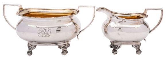 A George III silver sugar basin and milk jug, markers marks not struck, London 1811,