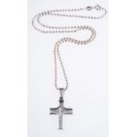 A cross designed pendant set with a brilliant-cut diamond, measuring 3.0cm x 1.50cm (inc.