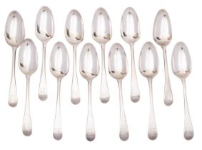 A set of twelve Georgian silver Old English pattern table spoons, maker W T, London 1768/69,